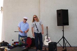 All smiles while setting up for the gig outside on State Street in Santa Barbara, CA at Borders. Thank goodness for the extra dark glasses, however...