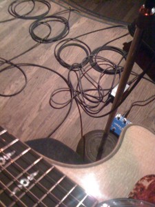 A mess of cables, a guitar, a mic stand, and a stool. That's what I'm after tonight at Rockit Room.