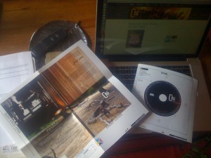 Pouring over new cover art, inset layout, and disc art for final approval before going to replication.