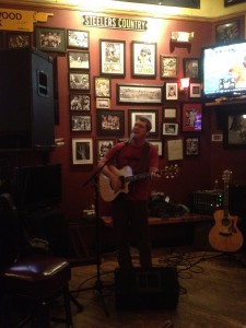 SF singer/songwriter Mike Gibbons taking the stage for a few tunes and doin' it right!