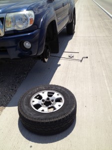 Half of the way there... Changing a flat on the I-15 en route to Las Vegas. NV.