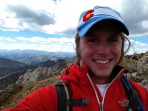 One big sunburned smile from Colorado and the summit of Mount of the Holy Cross.